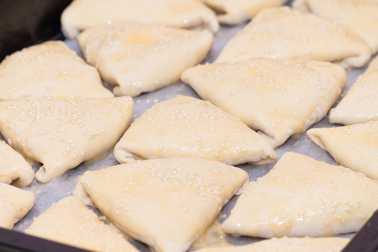 Indian, Asian food raw samsa or samoses. Preparation, cooking.