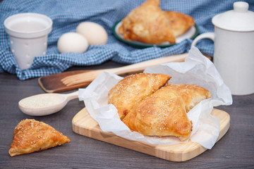 Indian, Asian food delicious samsa or samoses on wooden background.