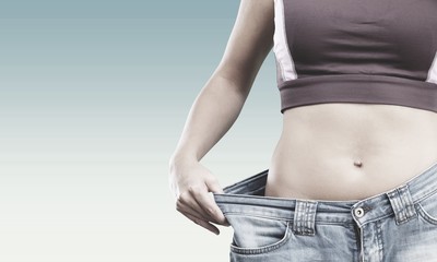 Perfect waistline of a beautiful young woman