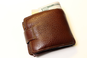 Brown wallet on white background isolated.