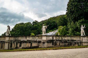 Fototapeta na wymiar View of the fountains with statues of the Royal Palace of Caserta