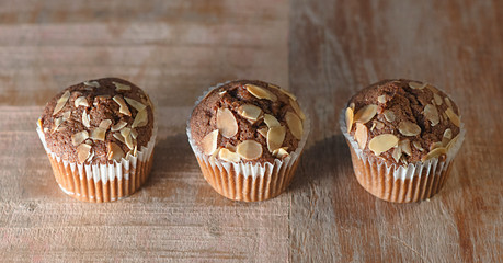 homemade cupcakes with almond chips and blueberry, tasty pastries