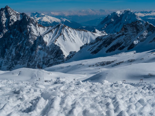 View from the German Zugspitze across the top of a snow mountain landscape