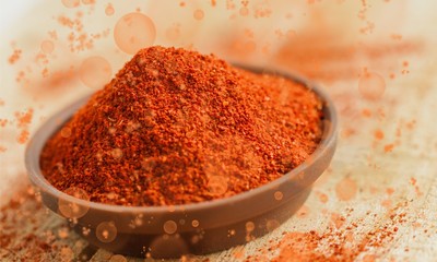 Aprika powder in wooden bowl