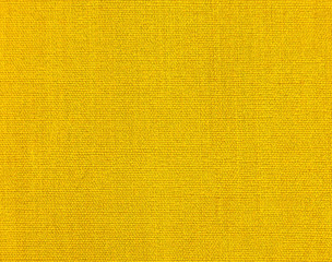 Textured yellow natural fabric. 