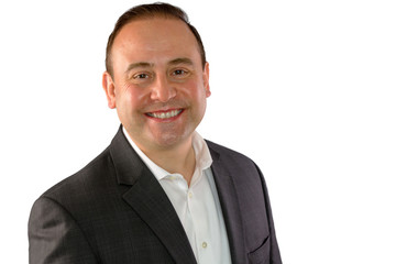 Happy businessman in suit with copy space