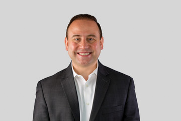 Smiling businessman portrait with copy space