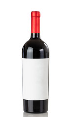Full bottle of red wine isolated on a white background