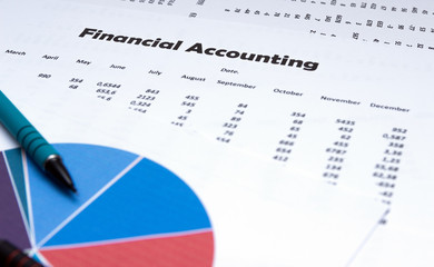 Financial accounting, Image a plurality of numbers on paper. Financial schedules.
