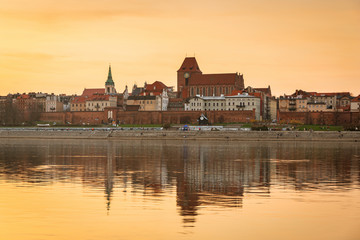Amazing sunset over Vistula river in Torun, Poland