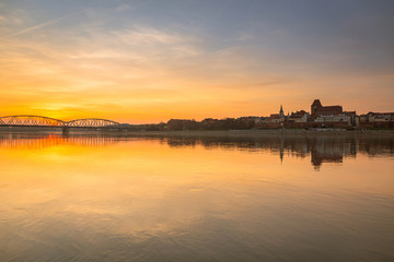 Fototapeta premium Amazing sunset over Vistula river in Torun, Poland