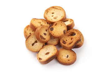 Freshly baked tasty crackers with raisins, close-up, isolated on white background