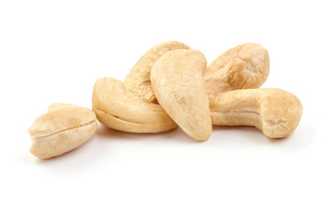 Raw cashew nuts, close-up, isolated on white background
