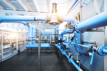 gas distribution unit and gas pipeline with level gauge in blue color with lampflare installed in the boiler room