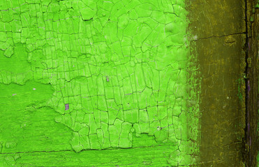 Fototapeta premium Old wooden background with remains of pieces of scraps of old paint on wood. Texture of an old tree, vintage wood background peeling paint. old blue board with cracked paint
