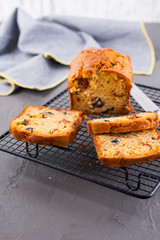 Traditional Italian bread with dried tomatoes and olives. Homemade cakes for lunch and breakfast and ingredients. Free space for text. Copy space