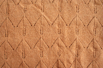 brown color knitted wool as background