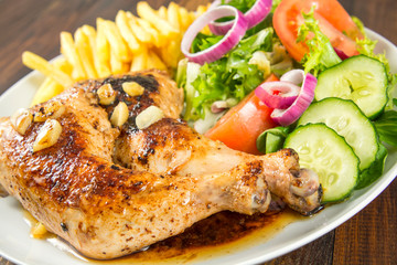 Muslos de pollo asado