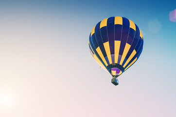 Colorful hot air balloon flying in the blue sky
