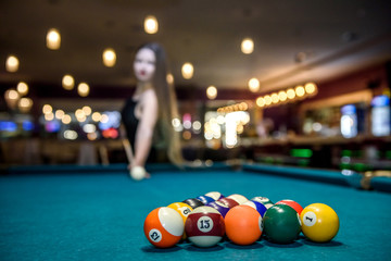 Selective focus on billiard balls triangle on table