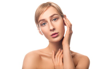 Fototapeta premium Beautiful blonde hair girl with clean nude makeup isolated white background. Skin care concept