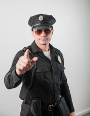 American police officer with a folder of documents