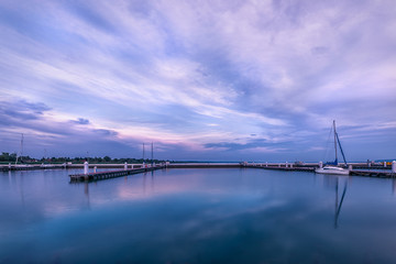 Fototapeta na wymiar Lake Balaton vibrant colourful sunrise at the dock in Balatonfenyves , Hungary