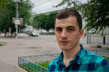 Portrait of a guy on the streets of the city
