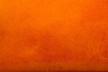 Bright brown leather texture as vintage background.