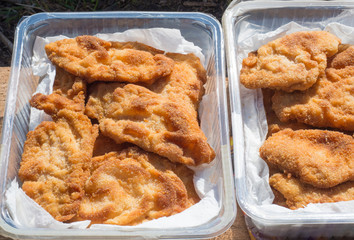 close up bow with wiener schnitzel fried pork steak packed for snack on trip