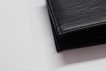 Black wallet isolated on white background with space for text