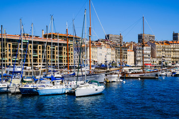 Fototapeta na wymiar MARSEILLE, FRANCE - AUGUST 11, 2018 - Marseille embankment with yachts and boats in the Old Port. Vieux-Port de Marseille.