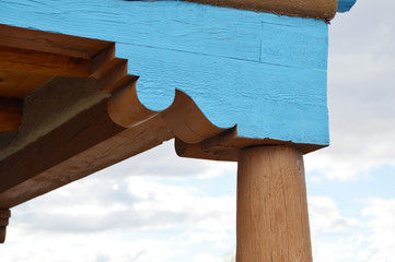 blue wooden cornice, spanish architecture