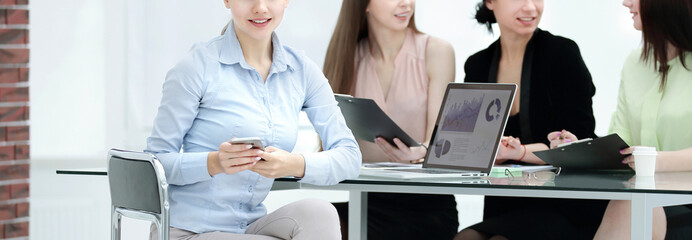 portrait of modern business woman at her Desk