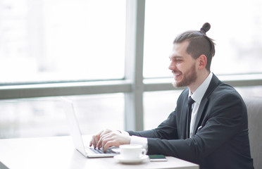 modern businessman typing on laptop.photo with copy space.