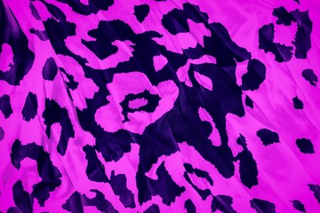Naklejka na ściany i meble Bright purple fuchsia color background with leopard print. Trendy leopard pattern.