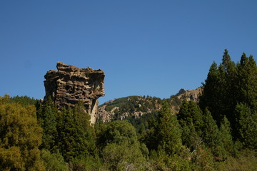Fototapeta premium Rock formations on the banks of the Caleufu River near Lake Meliquina, Patagonia Argentina