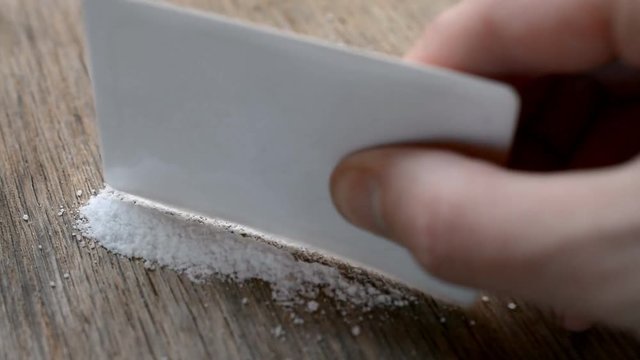 Splitting man hand Cocaine On The Table HD stock footage