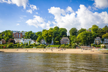 Summer view of the beach (Strand Oevelgoenne) on the Elbe river in Oevelgoenne district of Hamburg...