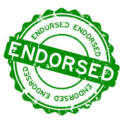 Grunge green endorsed word round rubber seal stamp on white background