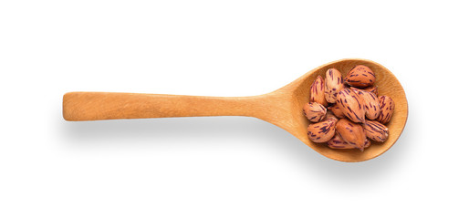 peanuts ,thai name is tiger-stripe beans in wood spoon isolated on white background. top view