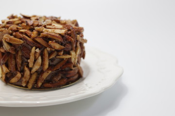 Almond Chocolate Cake on White Background