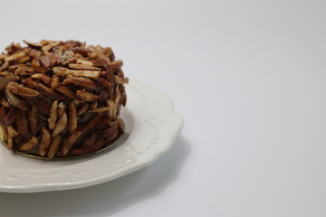 Almond Chocolate Cake on White Background