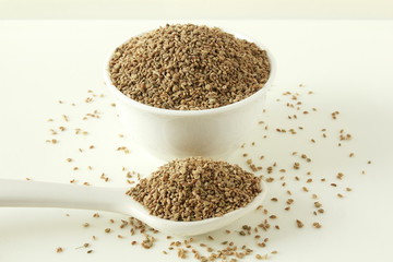 ajwain or Trachyspermum ammi,caraway herb spice seeds in bowl and spoon
