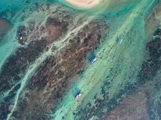 Aerial view of beautiful  seascape with fishing boats in the coast