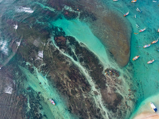 Aerial view of beautiful  seascape with fishing boats in the coast