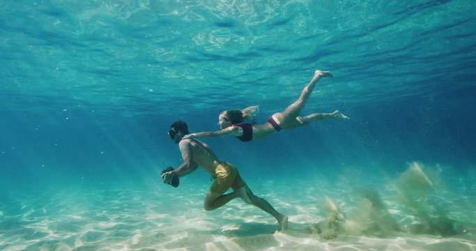 Couple does underwater workout together