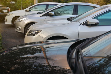 Naklejka premium image concept of business car, row of many modern vehicle parked on street