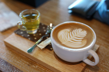 hot latte coffee drink put on table in the morning day