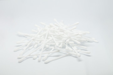 Cotton sticks buds heap isolated on white background